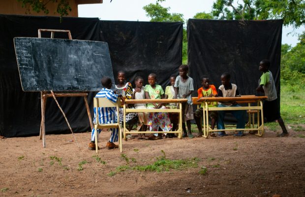 African schoolkids following a language lesson outside – schoolboard teach student travel africa African schoolkids following a language lesson outside - schoolboard teach student travel africa